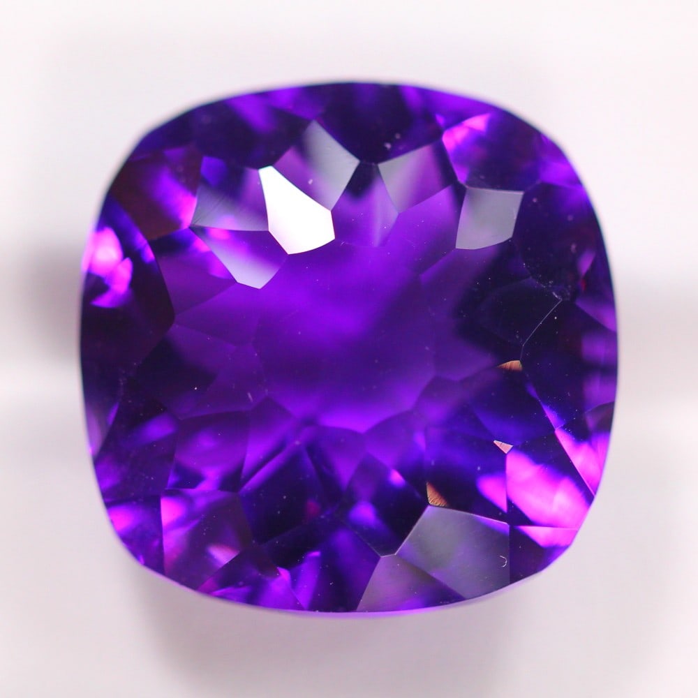 Exquisite 22.70 Carat Uruguayan Amethyst – Perfect for Fine Jewelry: Auction lot of 22.70 carat Uruguayan Amethyst, measuring 18.4x18.4x11.1mm. Birthstone for February and is often used in rings, pendants, and earrings. It is traditionally gifted for the 6th wedding an