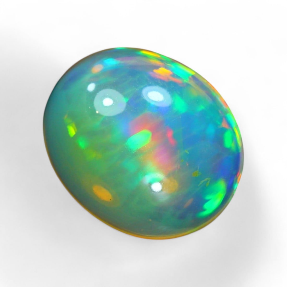 4.34 Carat Natural Ethiopian Welo Opal Solid Cabochon: Auction lot of Ethiopian Welo Opal Gem Type: Natural Welo Opal Carat Weight: 4.34Ct Dimension: 14.0 x 11.9 x 5.4 mm Origin: Ethiopian Treatment: Unheated/Untreated Type: Cabochon, Polished SKU: S8 Bir