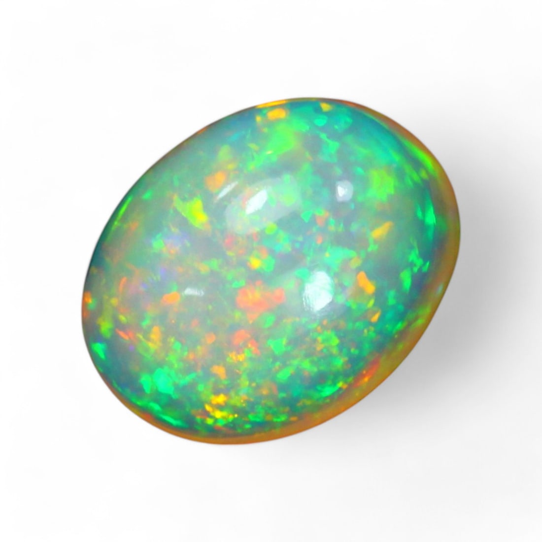 2.07 Carat Natural Ethiopian Welo Opal Solid Cabochon: Auction lot of Ethiopian Welo Opal Gem Type: Natural Welo Opal Carat Weight: 2.07Ct Dimension: 10.2 x 8.0 x 4.8 mm Origin: Ethiopian Treatment: Unheated/Untreated Type: Cabochon, Polished Birthstone f