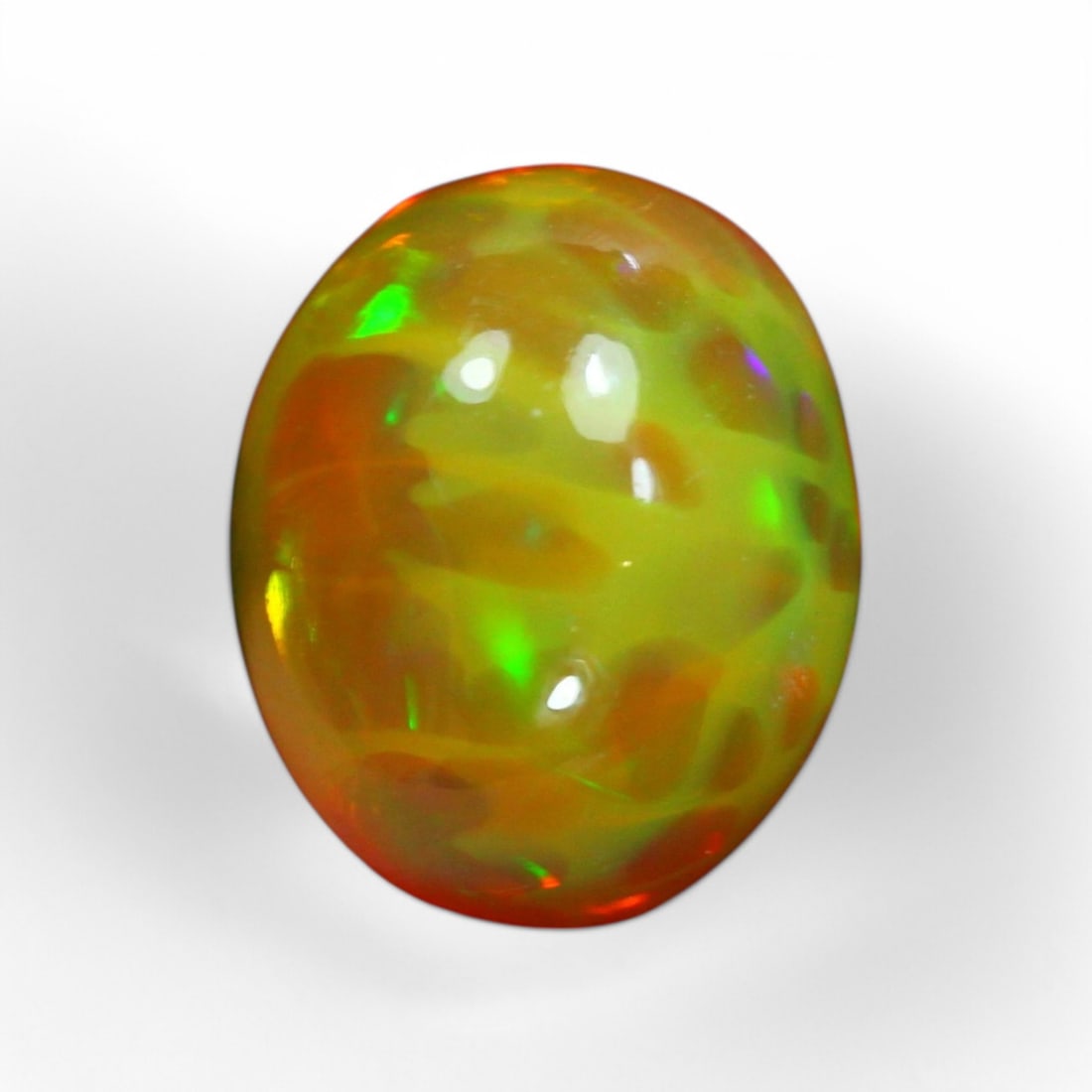 2.64 Carat Natural Ethiopian Welo Opal Solid Cabochon: Auction lot of Ethiopian Welo Opal Gem Type: Natural Welo Opal Carat Weight: 2.64Ct Dimension: 10.5 x 8.5 x 5.6 mm Origin: Ethiopian Treatment: Unheated/Untreated Type: Cabochon, Polished Birthstone f