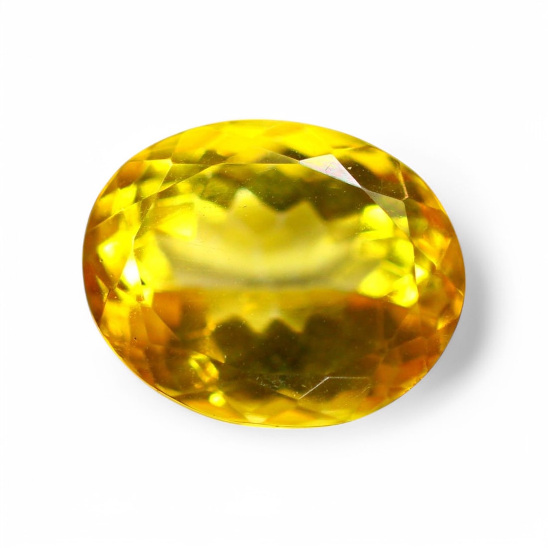 11.30 Carat Natural Brazilian Yellow Topaz Faceted Gems: Auction lot of Brazilian Yellow Topaz Gem Type: Natural Yellow Topaz Carat Weight: 11.30Ct Dimension: 14.1 x 11.2 x 8.4 mm Origin: Brazilian Treatment: Coated Type: Faceted, Polished Birthstone for De