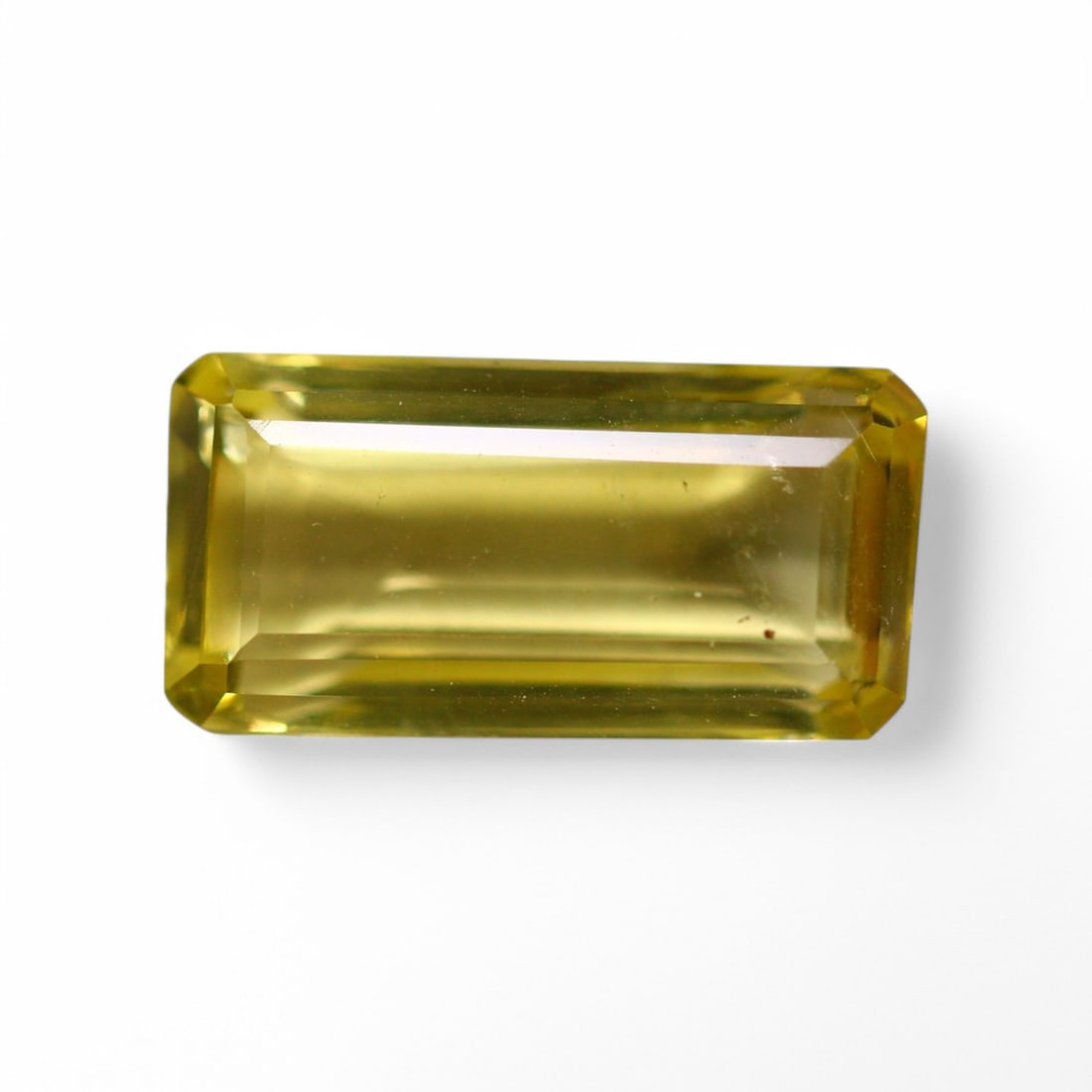 13.99 Carat Natural Brazilian Lemon Quartz Faceted Gems: Auction lot of Brazilian Lemon Quartz Gem Type: Natural Lemon Quartz Carat Weight: 13.99Ct Dimension: 20.2 x 10.1 x 8.0 mm Origin: Brazilian Treatment: Unheated Type: Faceted, Polished SKU:T10 Birthst