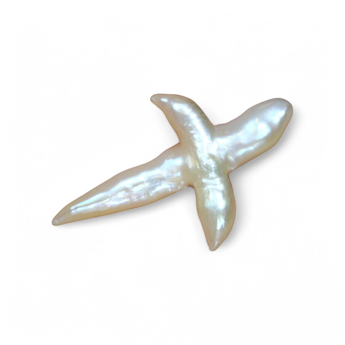 Exquisite 20.83 Carat Cultured Keshi Pearl: Auction lot of Keshi Pearl Gem Type: Natural Keshi Pearl Carat Weight: 20.83Ct Dimension: 41.1 x 25.7 x 7.5 mm Origin: Asian Birthstone for June and is often used in rings, pendants, and earrings.