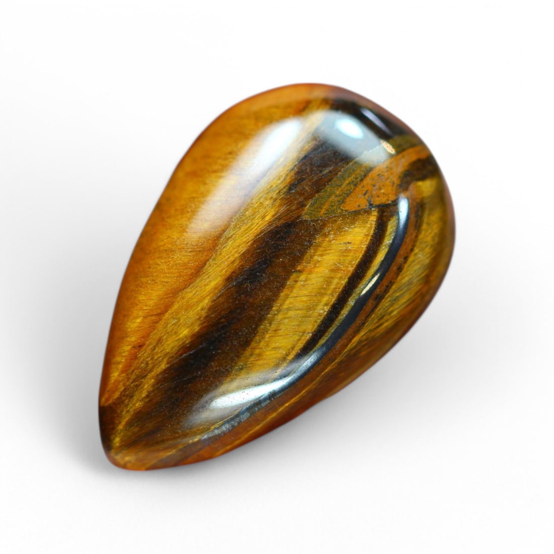 24.27 Carat Natural Golden Tiger Eye Cabochon: Auction lot of Africa Tiger Eye Gem Type: Natural Tiger Eye Carat Weight: 24.27Ct Dimension: 25.7 x 16.2 x 6.8 mm Origin: Africa Treatment: Unheated Type: Cabochon, Polished Birthstone for June and is