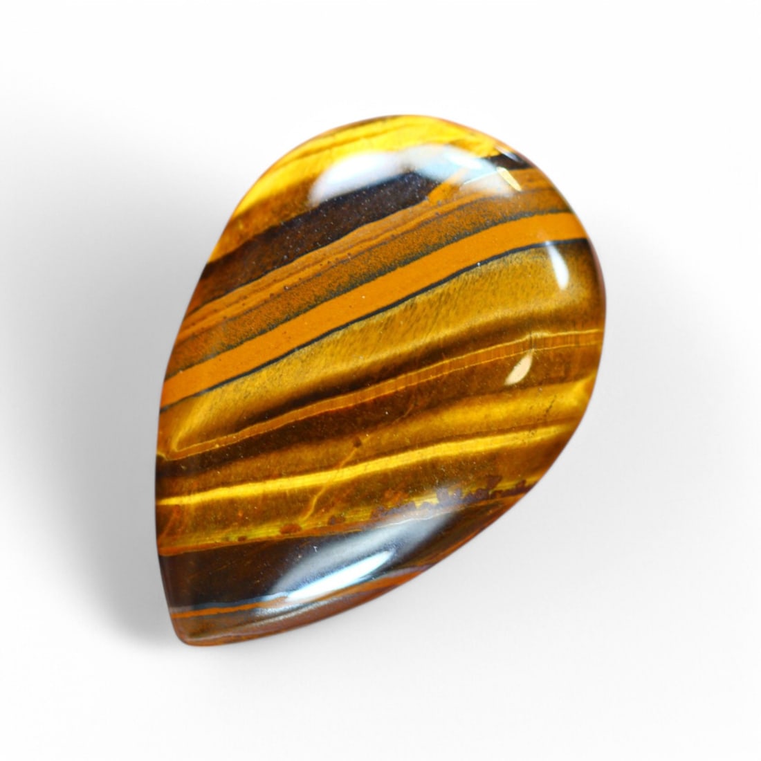 43.76 Carat Natural Golden Tiger Eye Cabochon: Auction lot of Africa Tiger Eye Gem Type: Natural Tiger Eye Carat Weight: 43.76Ct Dimension: 33.2 x 22.7 x 7.2 mm Origin: Africa Treatment: Unheated Type: Cabochon, Polished Birthstone for June and is