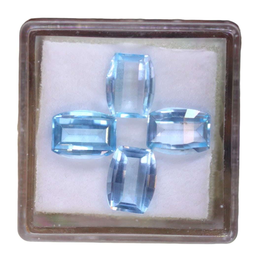 6.43 Carats Sky Blue Topaz Octagon Parcel - Natural Brazilian Stones: This elegant parcel of four octagon-cut sky blue topaz stones weighs a combined 6.43 carats, with each gem measuring approximately 8 x 6.1 x 3.5 mm. Cut with crisp, symmetrical lines, these gems exhib