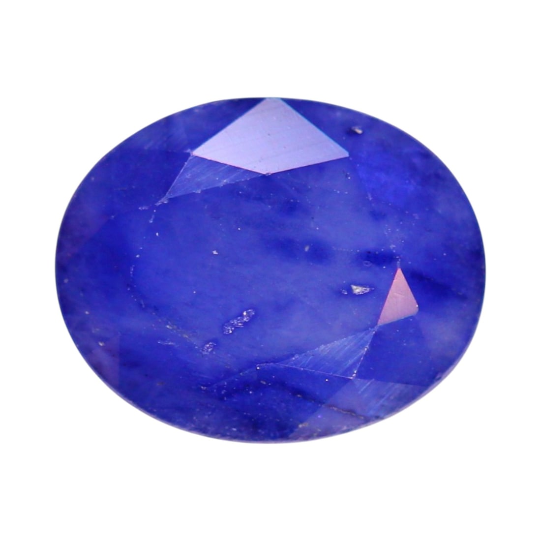 4.38 Carats Royal Blue Sapphire Oval - Natural Sri Lankan Stone: This 4.38-carat sapphire showcases a classic royal blue hue with velvety depth and elegant translucency. Cut in a well-proportioned 10.8 x 8.7 x 5.2 mm oval, the stone exhibits a richly saturated tone