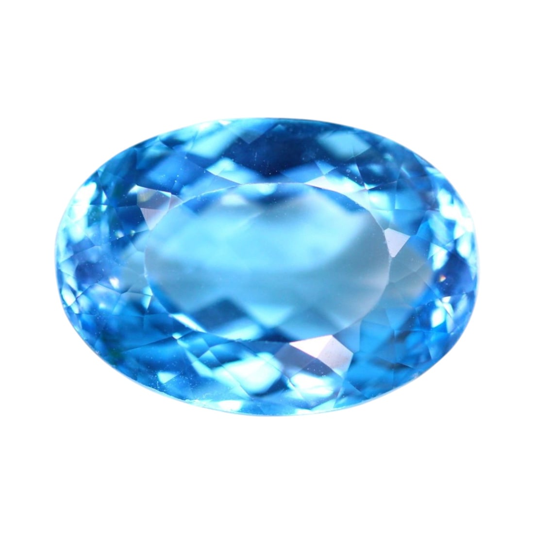 42.59 Carats Sky Blue Topaz Oval - Natural Brazilian Stone: Radiating with crisp, icy brilliance, this striking blue topaz captures the tranquil beauty of open skies and clear alpine waters. Its generous oval cut enhances the gem's vivid saturation and mirror-