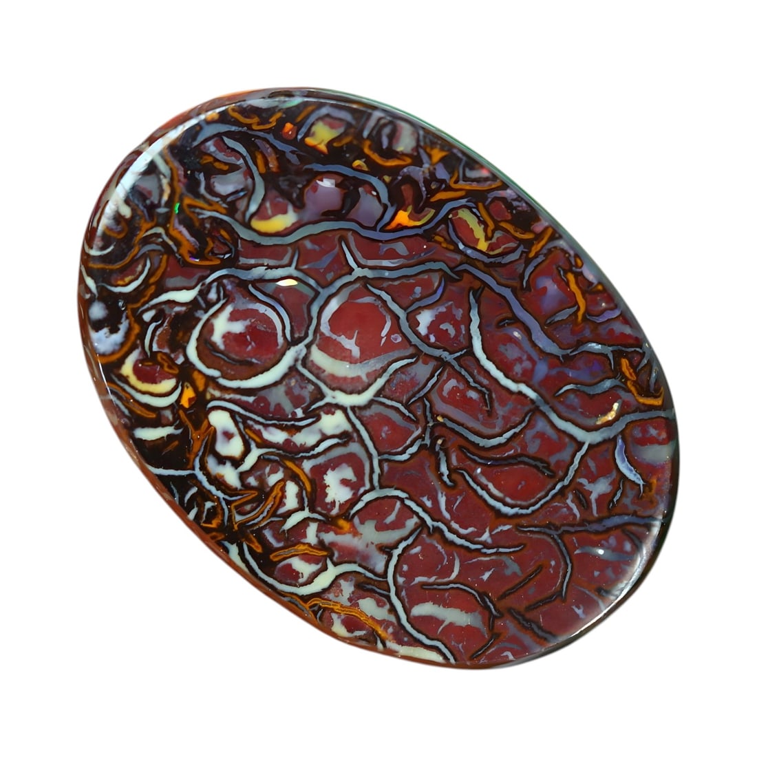 6.63ct Radiant Australian Gem Koroit Boulder Opal: This auction lot of 6.63-carat boulder opal from Koroit, Queensland, measuring 15.5x11.0x3.9mm, exemplifies the mesmerizing craftsmanship and vibrant cultural significance of Australian opals. Boulder