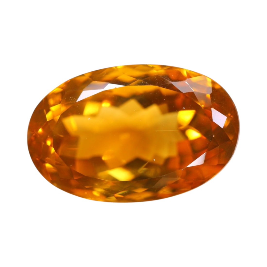 38.36 Carats Honey Yellow Quartz - Natural Brazilian Gem: Commanding in both size and color, this 38.36 carat honey quartz is a showpiece gem cut into a substantial oval measuring 25.8 x 16.8 x 14.1 mm. Its rich golden-amber hue glows with warmth and depth,