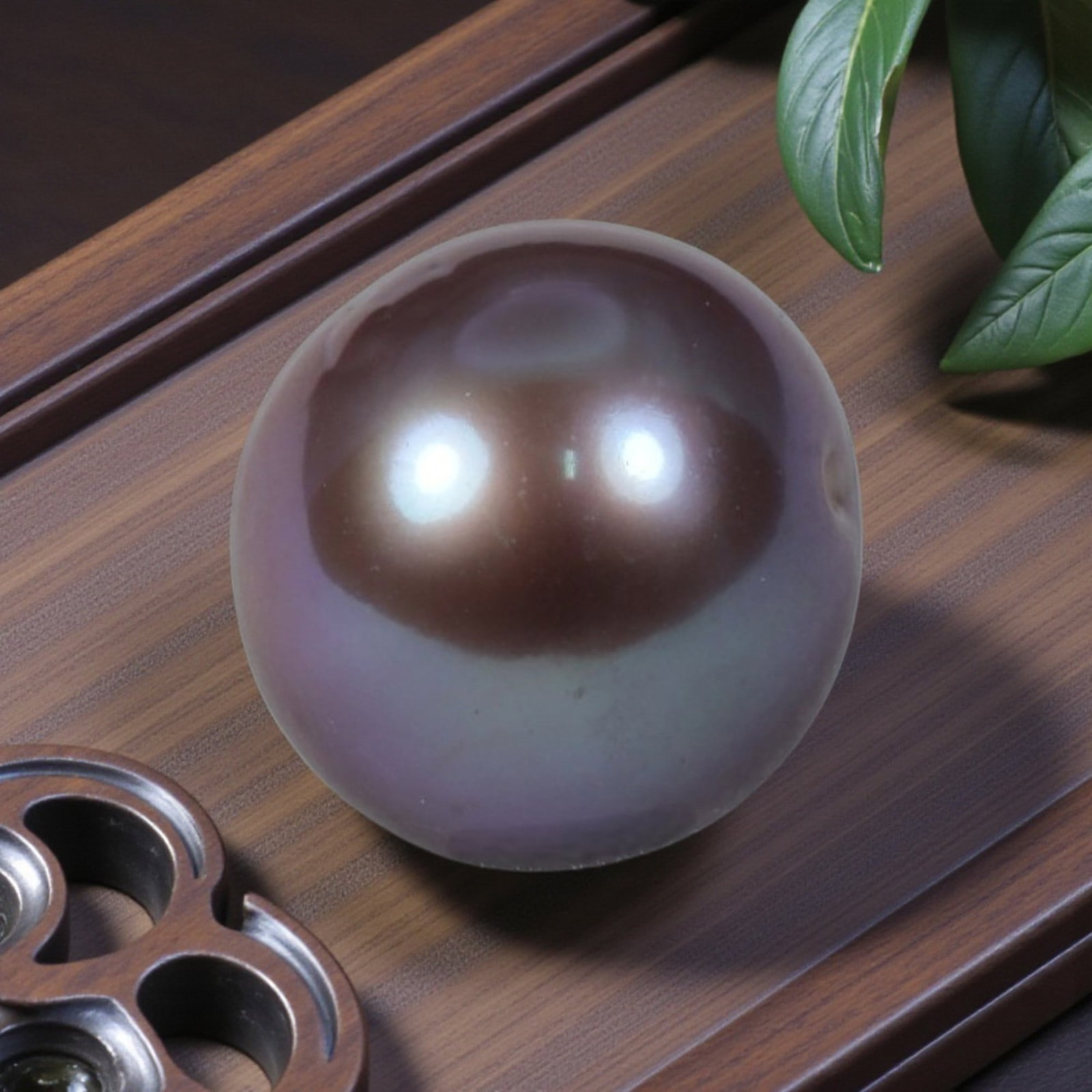 10.95ct Natural Freshwater Pearl - Smooth Lavender Sphere 11.3mm, 42YG: This specimen is natural freshwater pearl, fully polished into a symmetrical spherical cabochon exhibiting soft lavender nacre iridescence with warm brown reflective overtones. A small suspension dril