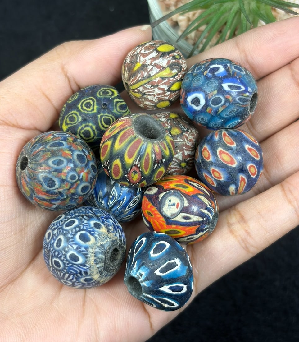 Antique Glass Bead - Islamic Jatim Mosaic Ikat Feather Bead, 41YH: These spherical beads are crafted from hand-worked polychrome mosaic glass, constructed using the millifiore technique with layered coloured glass inlays forming repeating ikat and feather-style patte