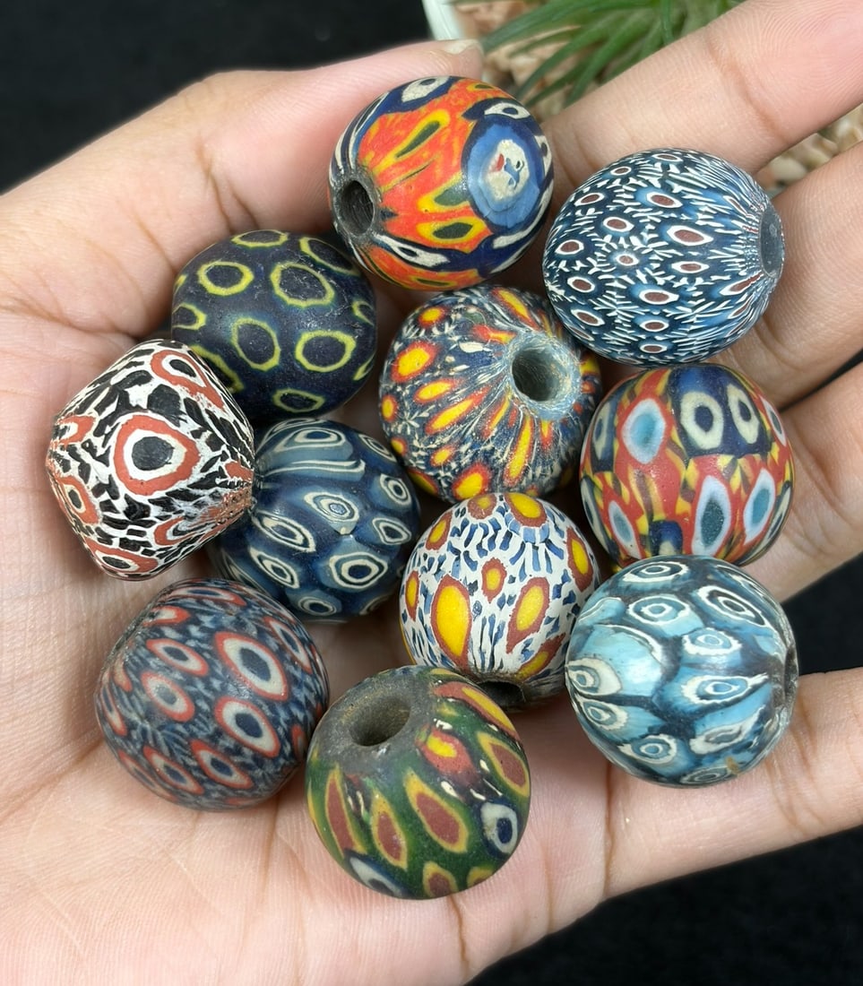 Antique Glass Bead - Islamic Jatim Mosaic Ikat Feather Bead, 42YH: These rounded beads are hand fabricated polychrome mosaic glass crafted via traditional millefiori techniques, with fused multicolored glass canes forming repeating ikat and feather-inspired patterned