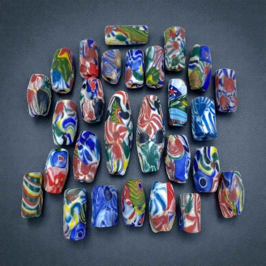 Lot of 27 Vintage Millefiori Elongated Tube Glass Beads 2-4cm Multicolor Swirl Lampwork Beads, 86AA: Vintage bulk set of 27 handcrafted elongated tube & barrel millefiori lampwork glass beads, each measuring 2-4cm in length. Features chaotic vibrant swirl marbled patterns mixing blue, red, white, gre