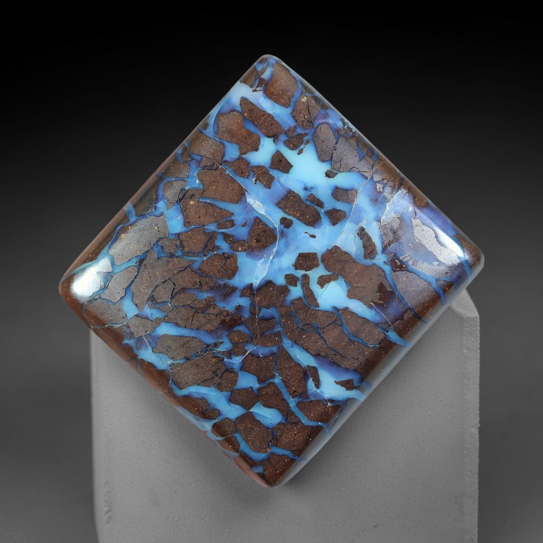 44.47ct Natural Australian Queensland Matrix Boulder Opal Square Cabochon, 8AV: Hand polished large rounded square cushion cabochon of natural Queensland matrix boulder opal, featuring abundant speckled warm brown ironstone host rock fully interlaced with broad interconnected sky