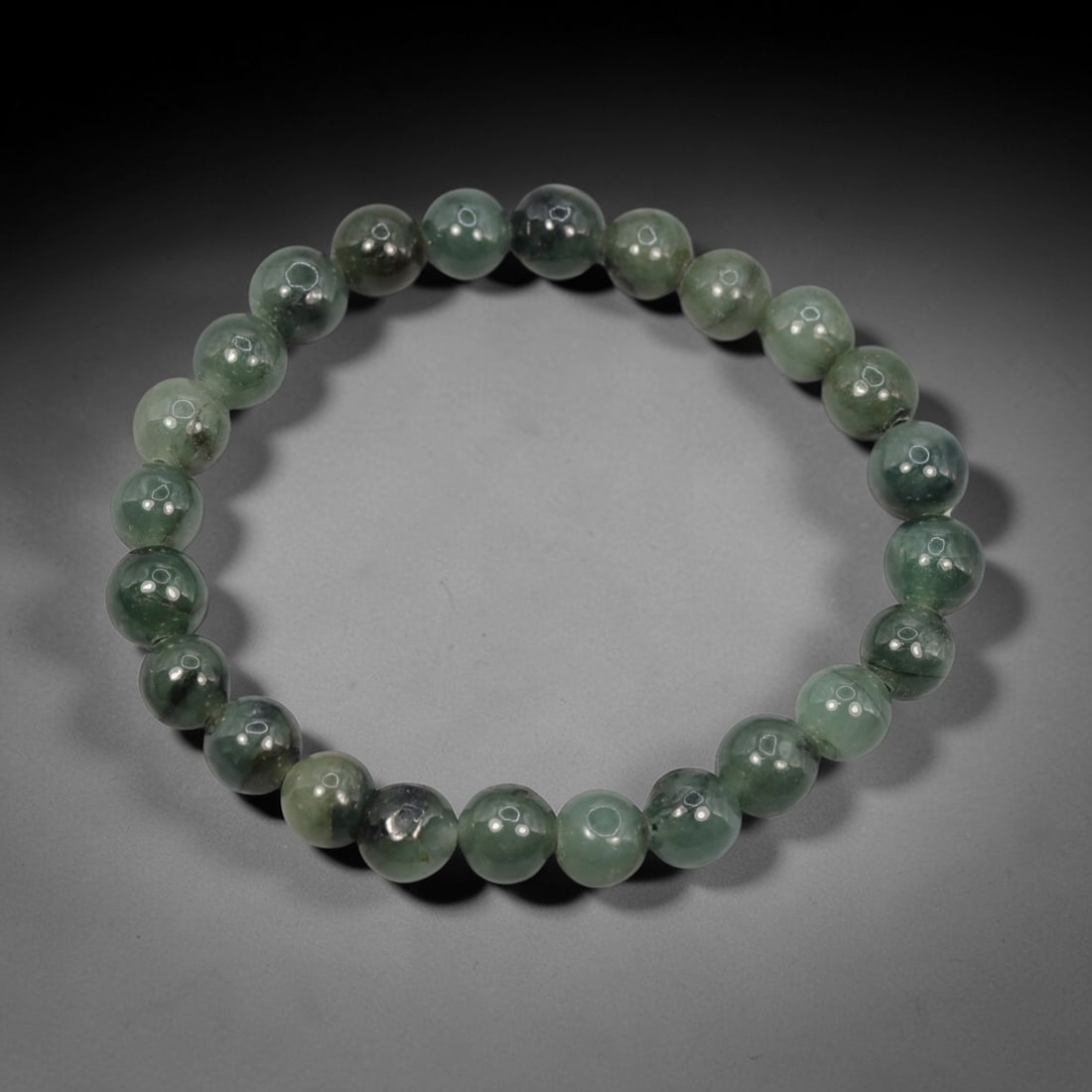 Natural Burmese Type A Jadeite Jade Round Bead Bracelet, 51ZK: Let me share with you this really nice strand of genuine Burmese Type A jadeite beads strung into a wearable bracelet with an approximate 5 centimeter inner diameter. These smooth polished round beads
