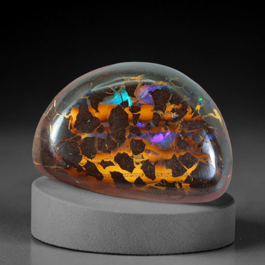 15.81ct Natural Australian Queensland Matrix Boulder Opal Cabochon, 79AT: Hand polished domed half oval cabochon crafted from natural Queensland matrix boulder opal, featuring dark ironstone host segmented by thick horizontal golden opal bands interspersed with vivid turquo