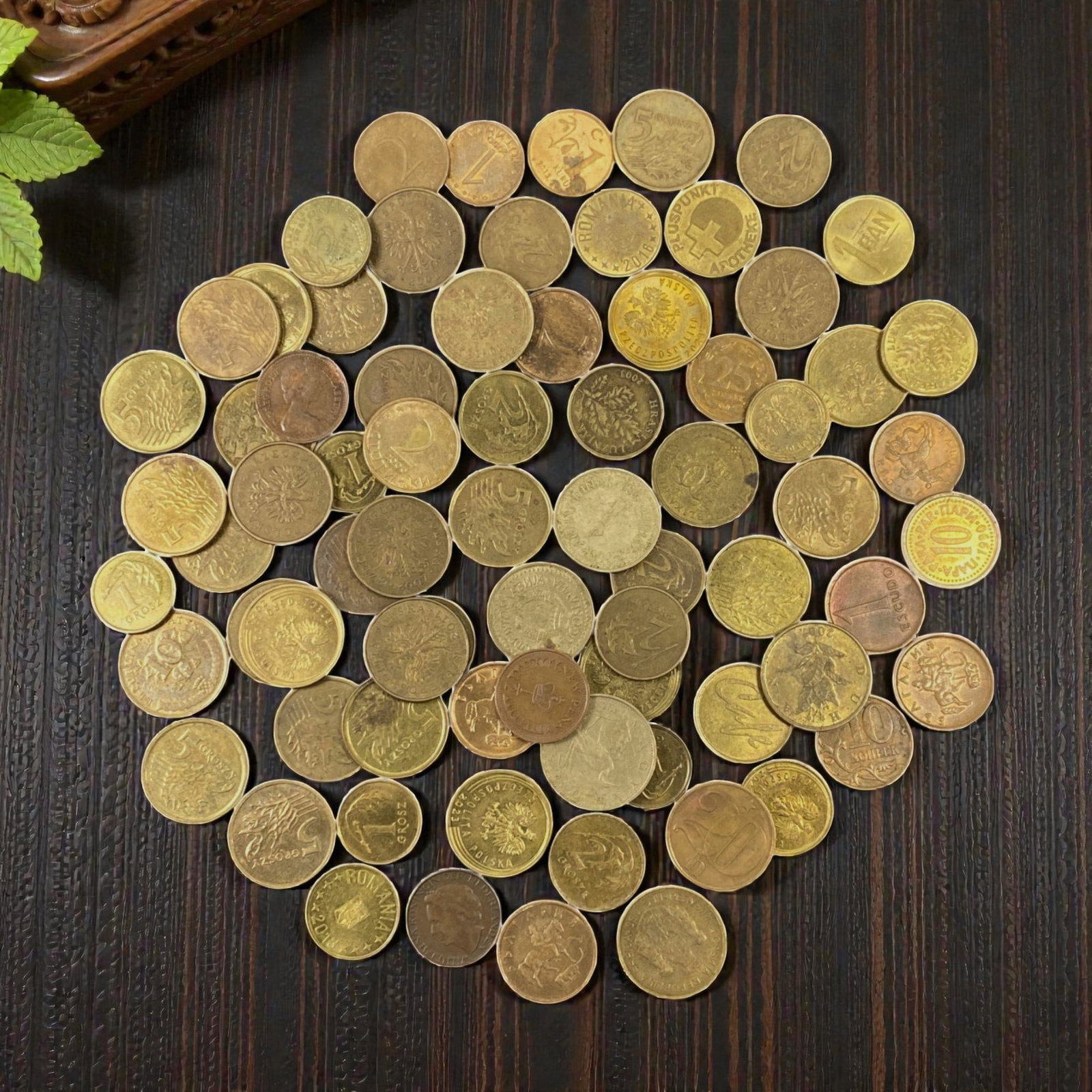CENTRAL EUROPE: Post-War Transition - Mixed Brass Coin Bulk Lot, 8V: This diverse lot of Central European brass coins captures the everyday currency of post-war and mid-20th century Europe. Featuring denominations from Poland, Romania, and other regional states, the co