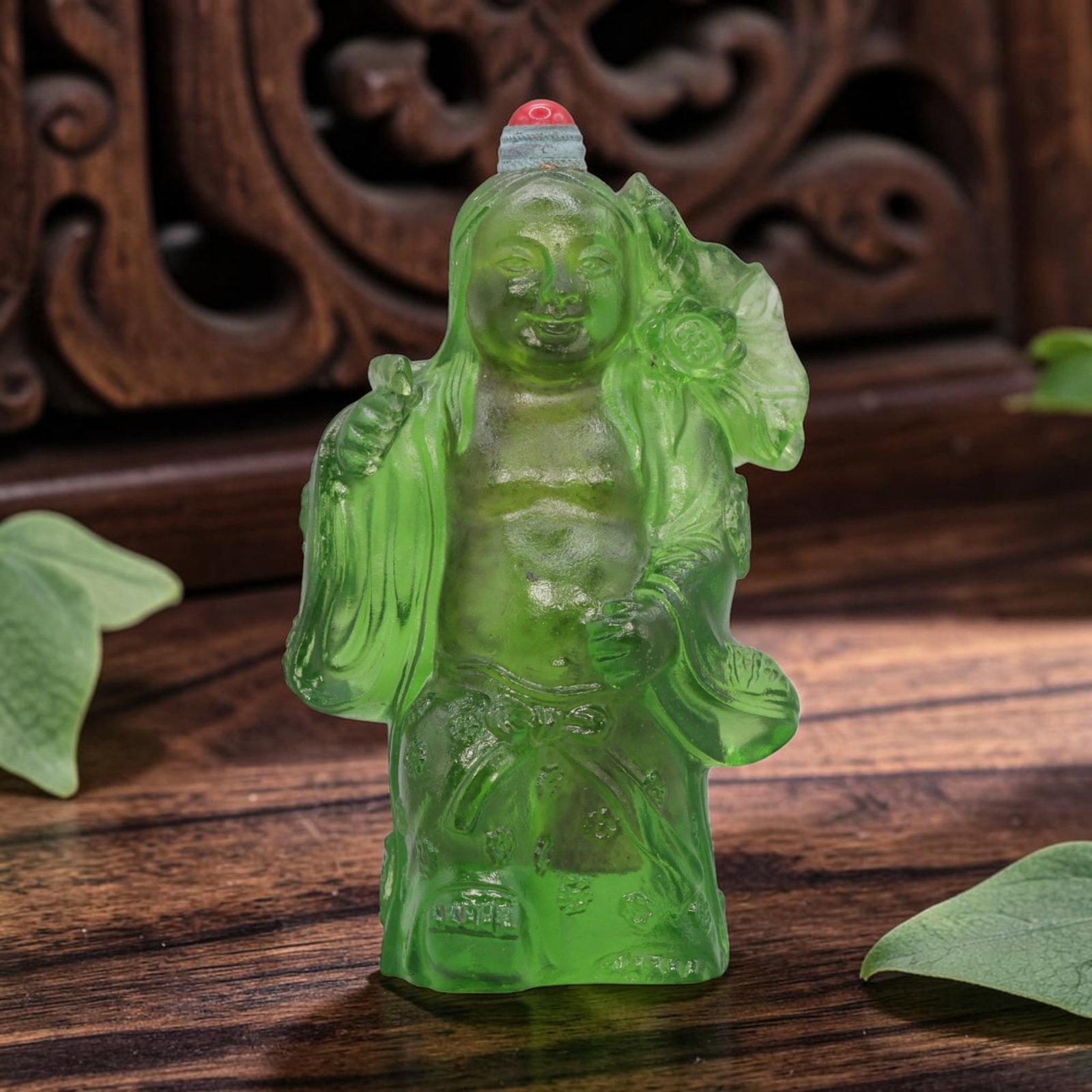 Vintage Chinese Green Liuli Glass Snuff Bottle - Budai Figurine, 79YF: Crafted from translucent rich green liuli glass, this vintage Chinese snuff bottle is modelled as a standing Budai figure. The glass exhibits a vibrant green hue with subtle tonal variations and surfa
