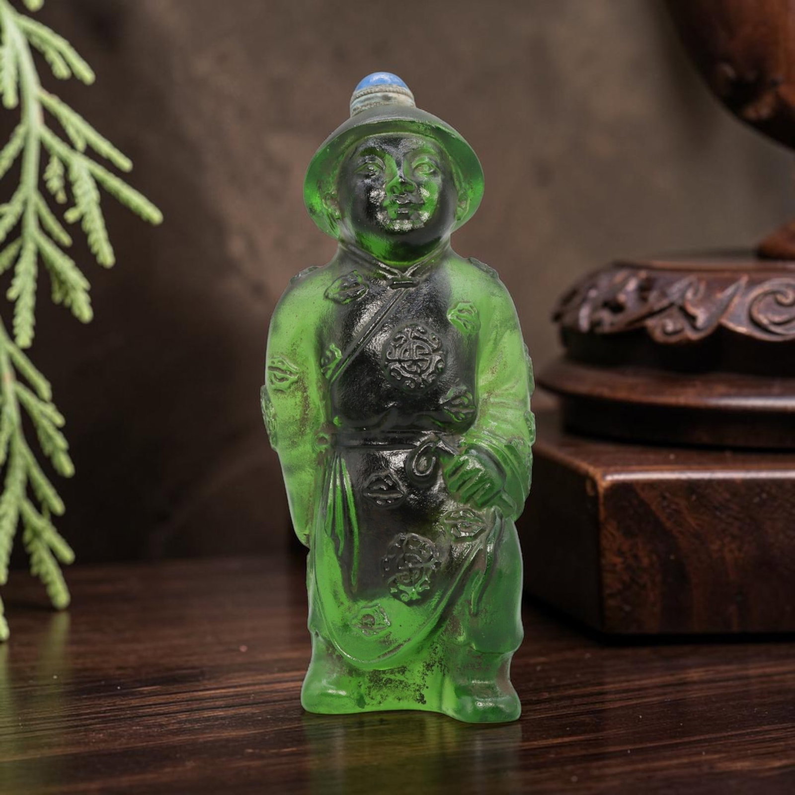 Vintage Chinese Green Liuli Snuff Bottle - Court Figure, 86YF: Crafted from translucent green liuli glass, this snuff bottle is formed as a standing court figure in traditional attire, adorned with carved floral and longevity motifs across the robe. The figure we