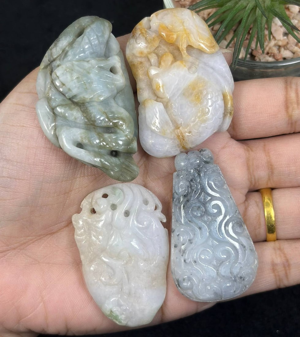 Lot Of 4 Natural Burmese Type A Jadeite Jade Carved Pendants, 9AS: This four-piece assortment features hand-carved pendants crafted from untreated natural Type A Burmese jadeite jade, showcasing traditional auspicious Chinese designs including detailed dragon relief 