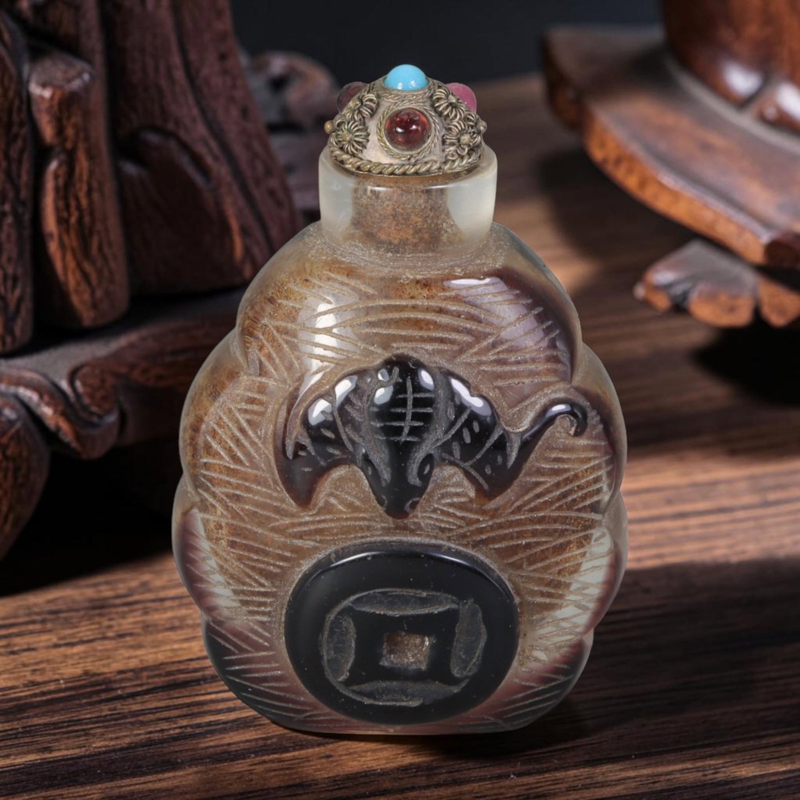 Vintage Chinese Liuli Glass Snuff Bottle - Carved Bat Coin Overlay Relief Vessel, 40AS: This gourd-shaped snuff bottle is crafted from translucent frosted vintage Chinese liuli glass with dark amber overlay carving across its scalloped silhouette. The front face features raised relief ca