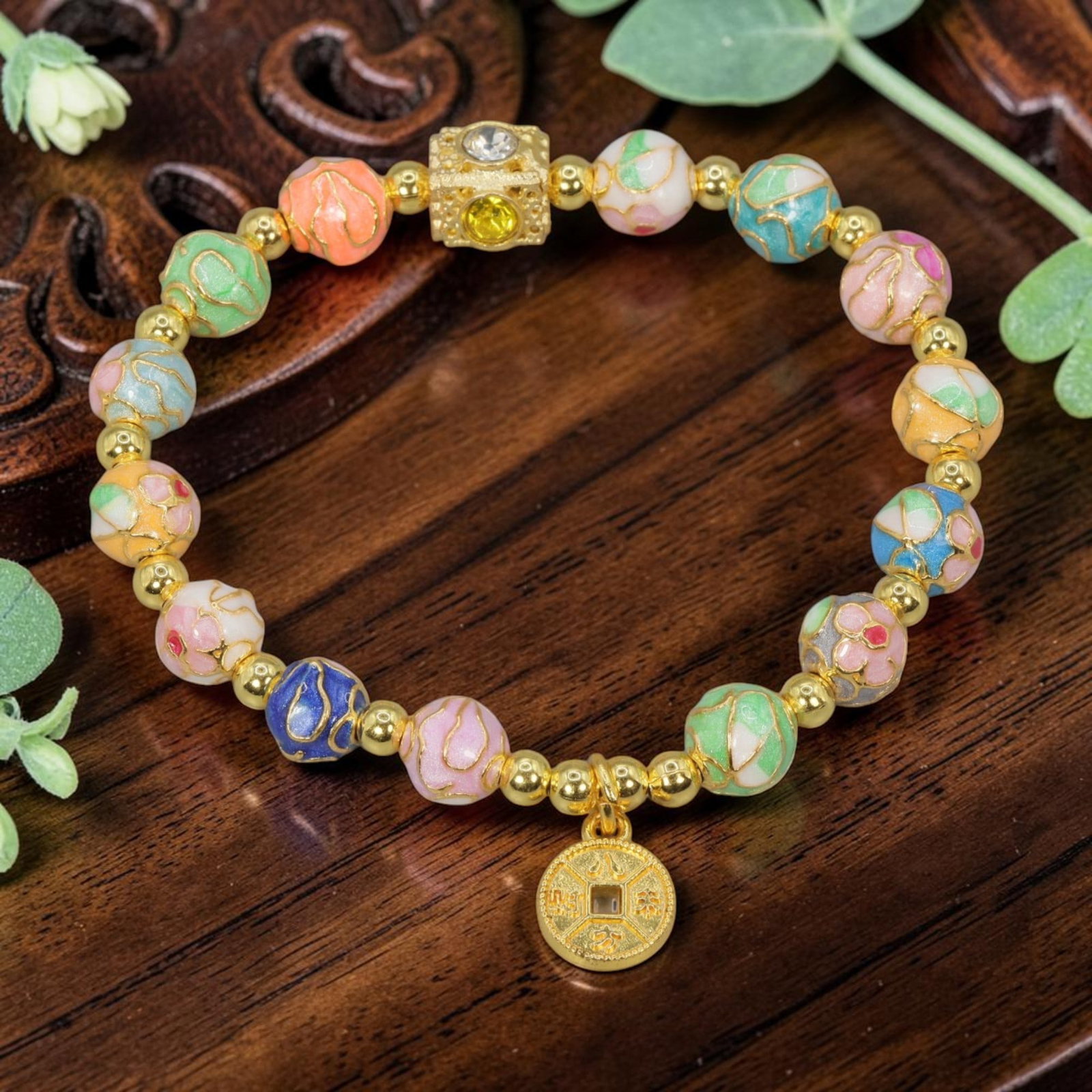 A Chinese Cloisonne Enamel Beaded Bracelet - Multicolor Gold Coin Charm, 43YJ: This modern Chinese-style bracelet features 9.70mm round cloisonne enamel beads in a vibrant mix of pastel hues, each detailed with raised gold-tone floral and cloud patterns. Small smooth gold-tone s