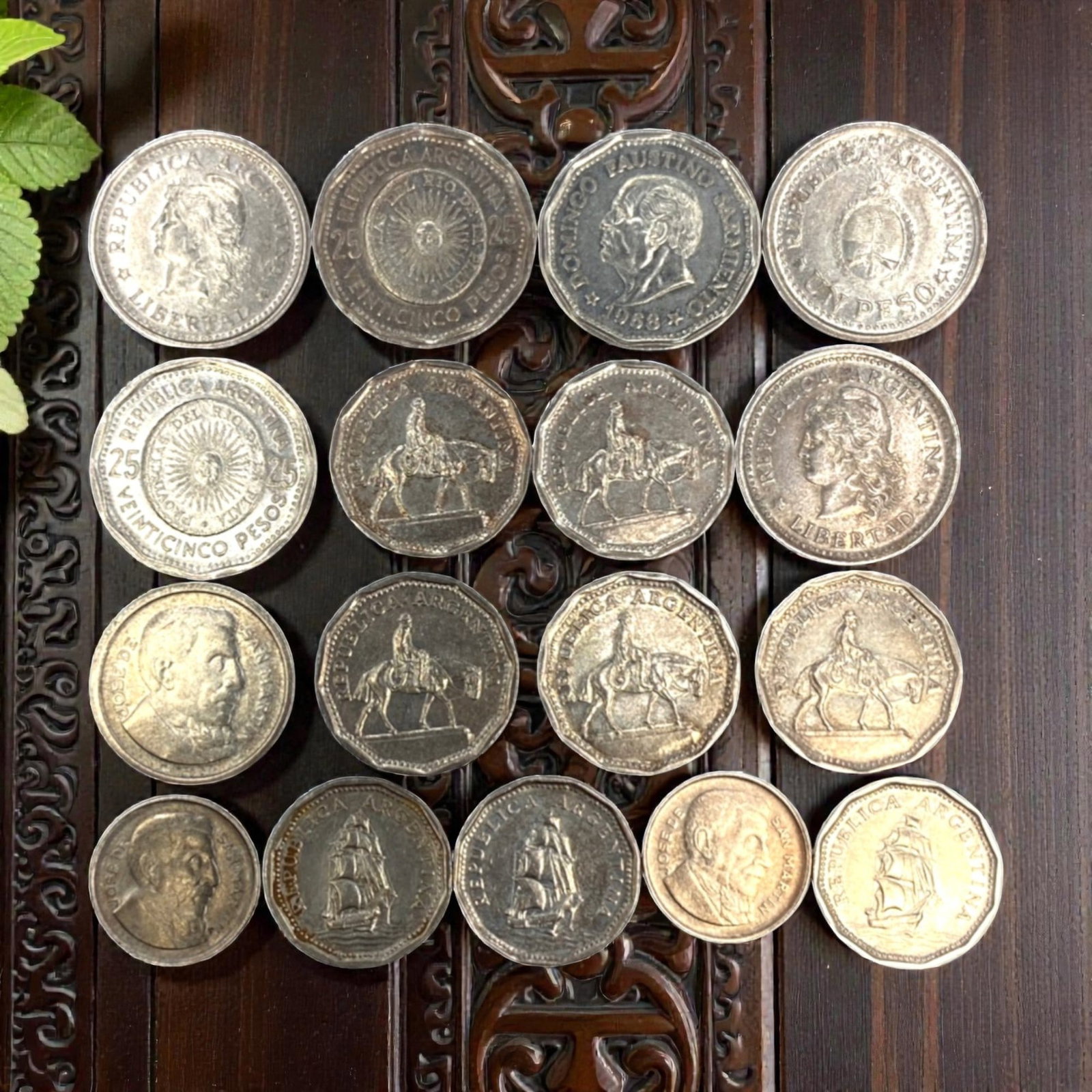 ARGENTINA: 20th-Century Economic & Political 17-Piece Coins Set, 1954-1969, 19-26mm, 54ZJ: This comprehensive 17-Piece Coins Set of Argentine coins, minted between 1954 and 1969, encapsulates a turbulent era of economic upheaval and political transition. Ranging from 19 to 26mm in diameter,