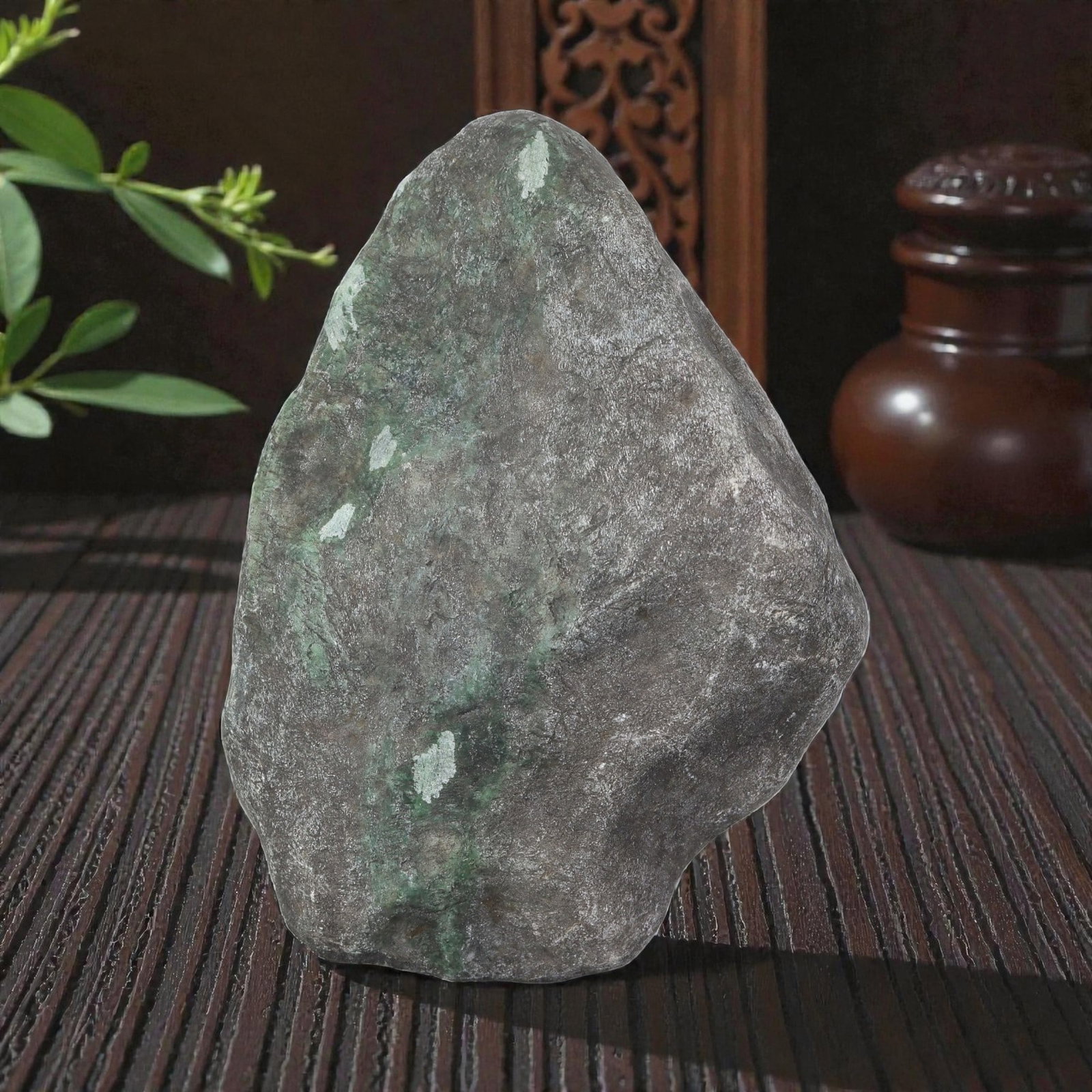 1535ct Natural Burmese Dark Skin Green Vein Jadeite Jade Rough Stone, 92EA: This is a natural Type A Burmese jadeite jade rough stone, measuring 9.5x6.7cm and weighing 307g (1535ct). It features a rugged dark grey mine skin with natural green veins and small windows revealing
