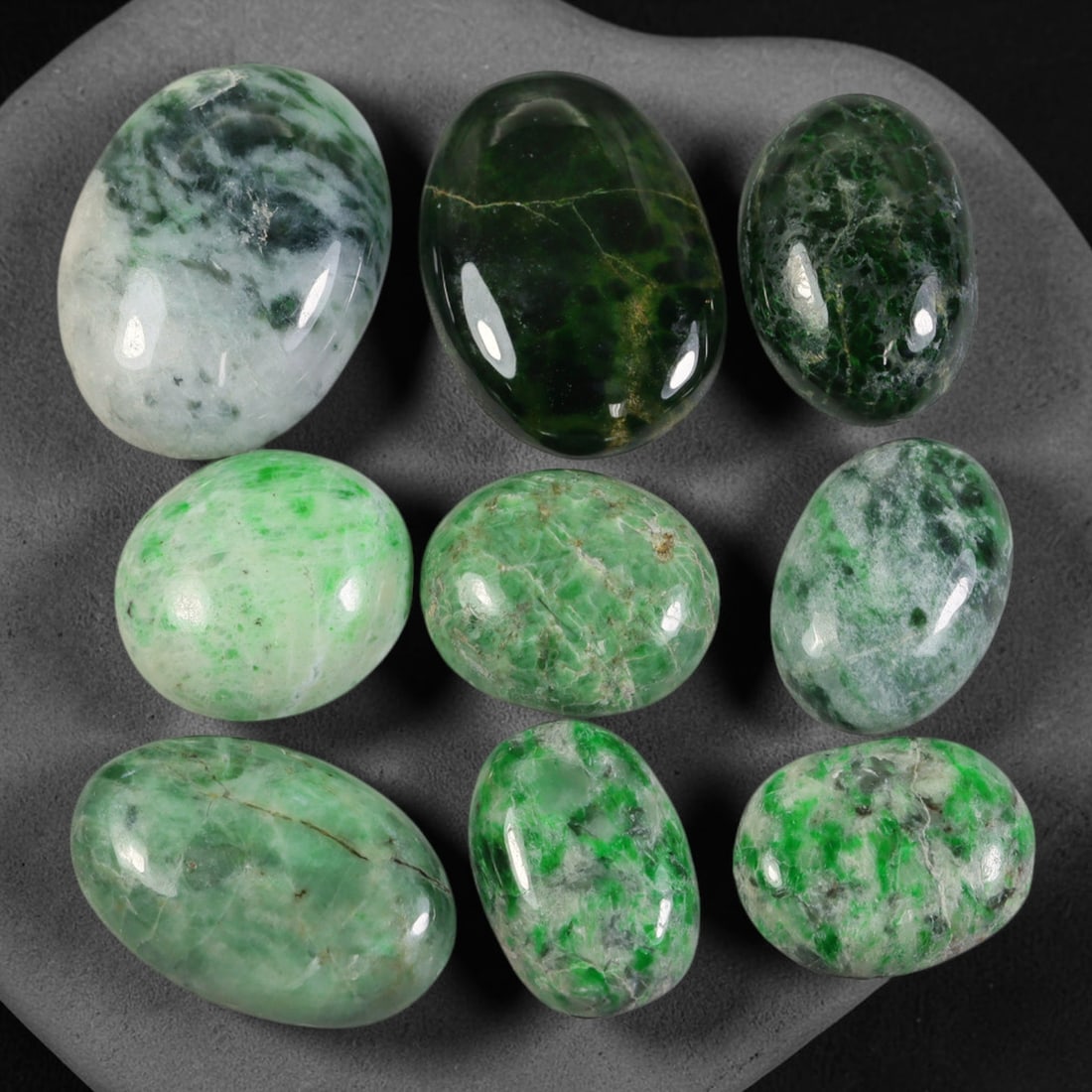 Lot of 9pcs 90ct Natural Burmese Type A Floating Moss Jadeite Jade Cabochons, 50AV: This wholesale bulk set includes 9 fully untreated natural Burmese Type A jadeite jade oval cabochons with a total combined weight of 90ct, uniform size 21x16mm. The lot features diverse natural green