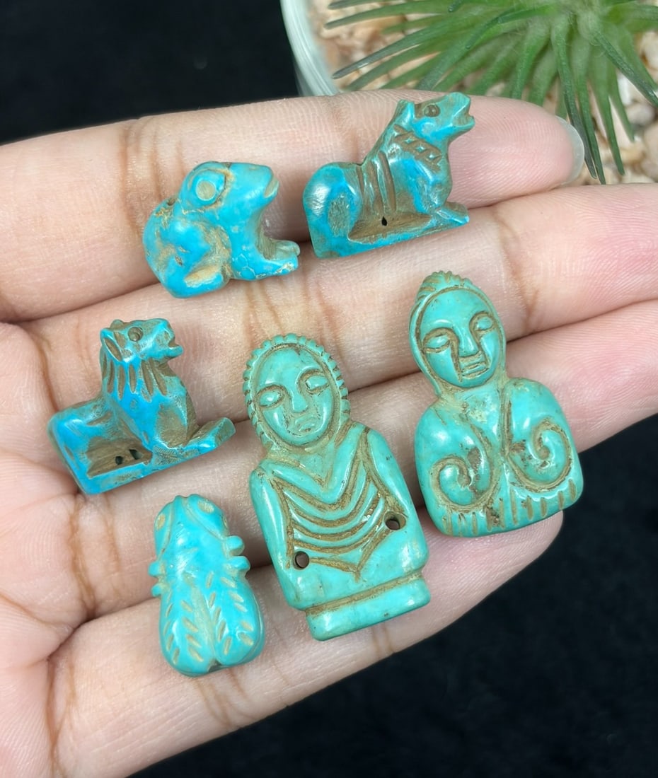 Lot Of 6 Antique Coptic Egyptian Style Turquoise Stone Zoomorphic Amulet, 80AR: Hand carved from turquoise hued stone, this assemblage comprises six individually shaped apotropaic amulets featuring varied iconography: seated lion figures, a stylized frog, cicada insect carving, a