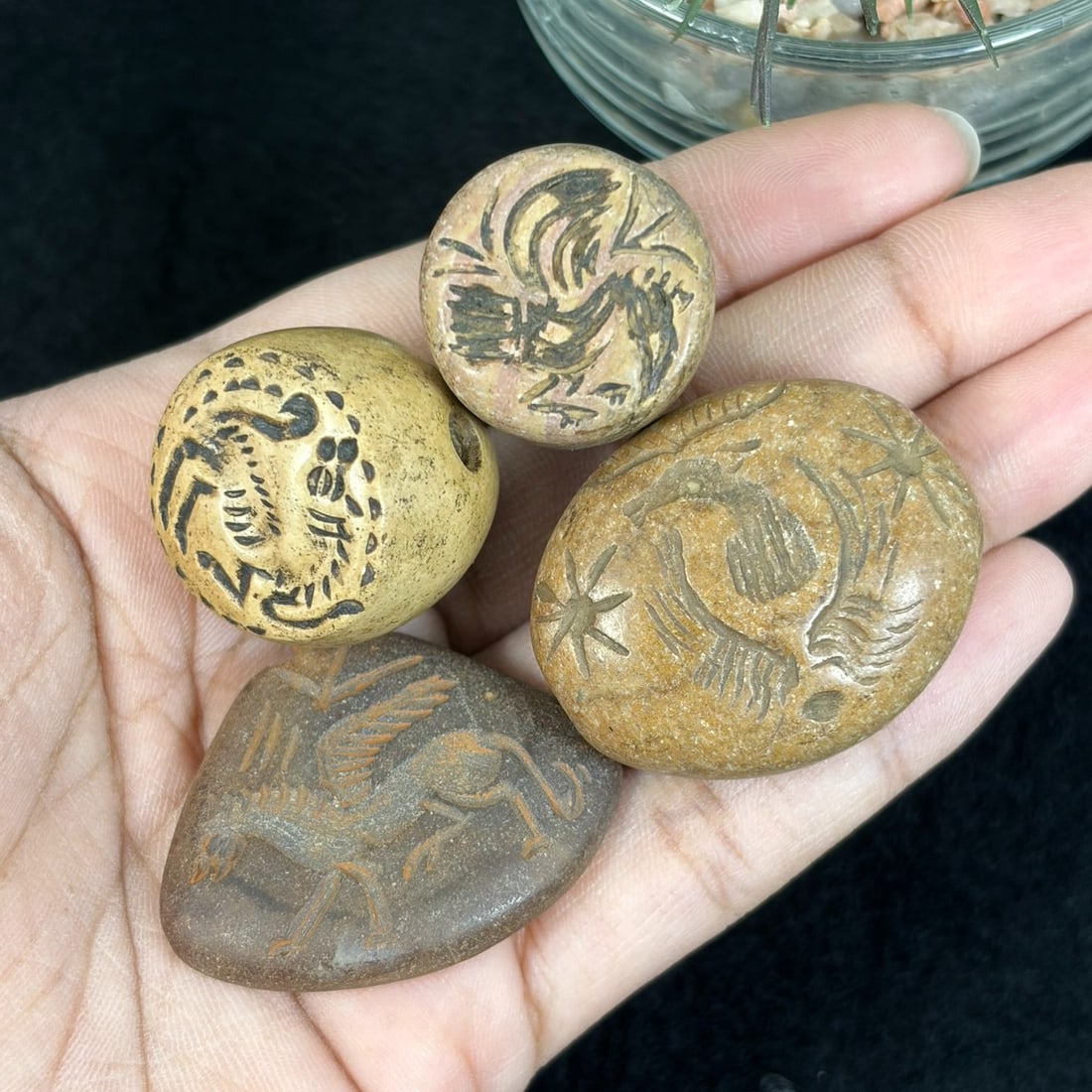 Lot of 4 Sasanian Era Ancient Stone Stamp Seal Amulets, 43YD: This four-piece grouping consists of authentic antique Sasanian hand-carved stone stamp seal amulets crafted from natural earth-toned sedimentary stone in warm beige, tan, and dark brown hues. Each sm