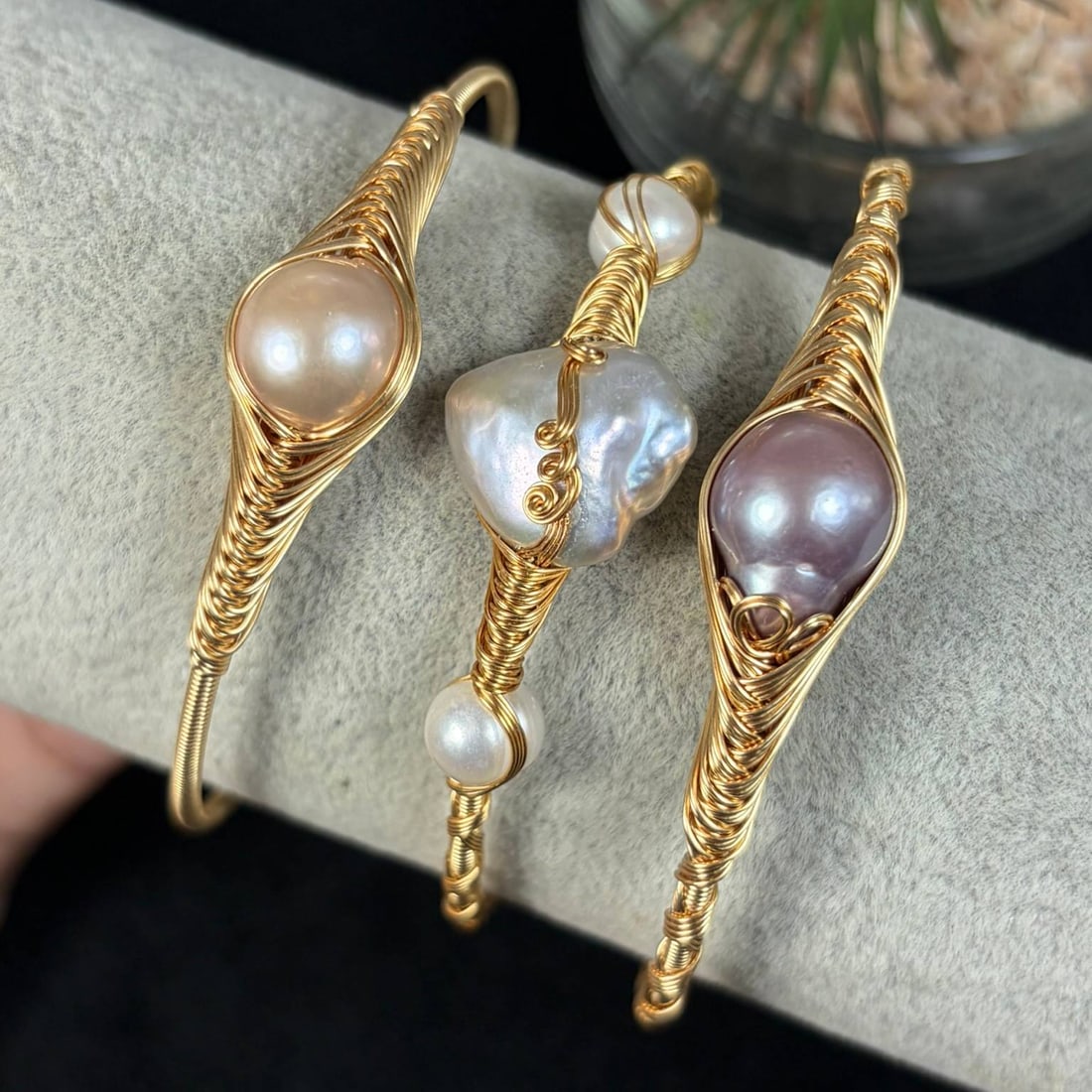 Lot of 3 Natural Multi-Tone Baroque Pearl Gold-Toned Wire Wrapped Open Cuff Bracelets Handmade, 8EB: Handmade set of 3 adjustable open cuff bangles made with gold-toned craft wire holding natural untreated freshwater pearls in champagne, white and pale purple shades with organic baroque shapes and so