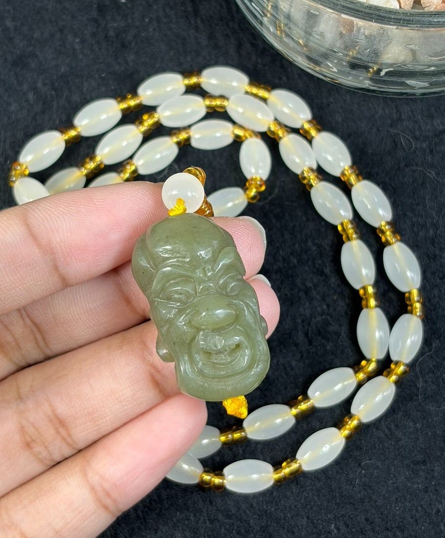 Natural White Afghan Irregular Jade Bead Necklace With Nephrite Hetian Luohan Head Pendant, 34AT: This wearable full-length necklace strand measures 62 cm total length, constructed from authentic untreated natural white Afghan jade irregular pebble beads. Each bead boasts a soft milky creamy white