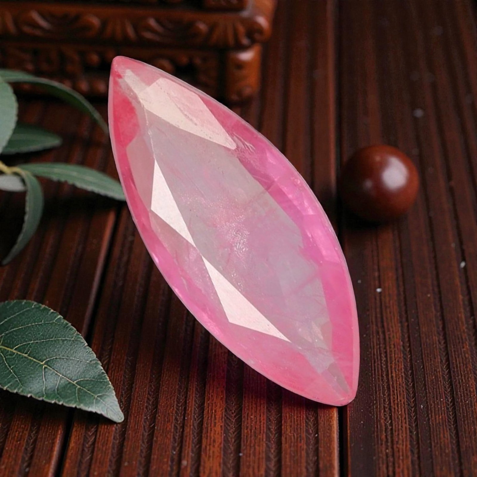 2.25 Carats Certified Orange Pink Sapphire - Natural Ceylon Gemstone, LZ114: This striking 2.25 carat marquise-cut sapphire captivates with a delicate orange-pink hue, a rare and sought-after shade that evokes the soft glow of a tropical sunrise. The elegant marquise cut enhan