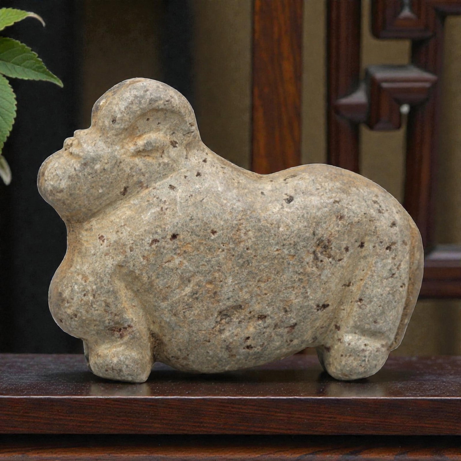 Ancient Stone Zoomorphic - Near Eastern Animal Figurine, 36ZR: Carved from dense speckled grey-brown stone with a heavily weathered earthy patina, executed in a robust, stylized form characteristic of ancient Near Eastern zoomorphic craftsmanship. The figure depi