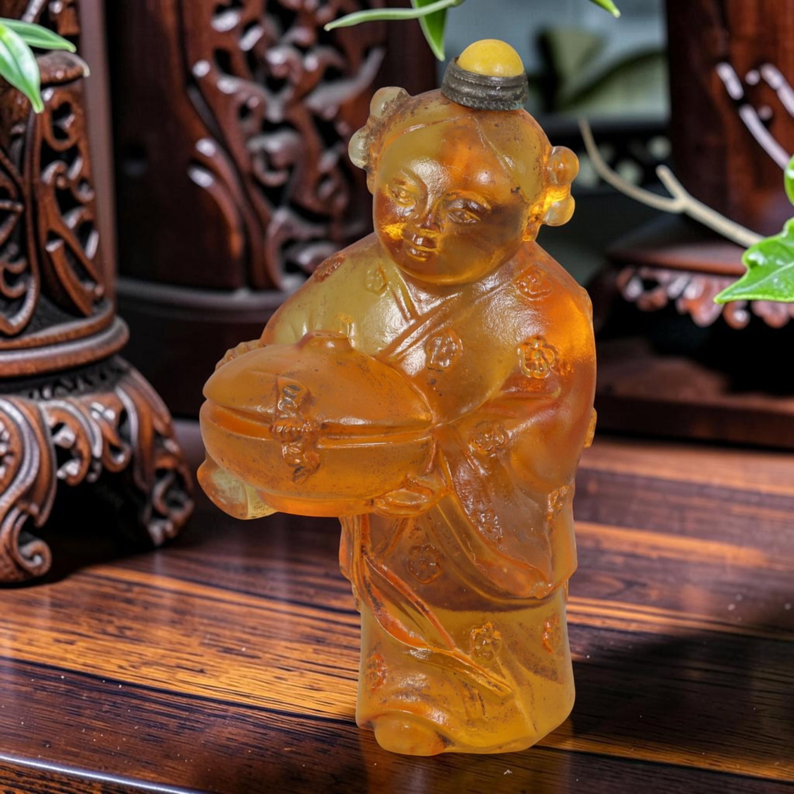 Vintage Chinese Liuli Glass Snuff Bottle - Carved Girl With Lidded Offering Box Amber Figurine, 50AS: This fully sculpted anthropomorphic snuff bottle is crafted from warm translucent frosted honey-amber vintage Chinese liuli glass, shaped as a traditional young girl adorned with twin rounded hair bun