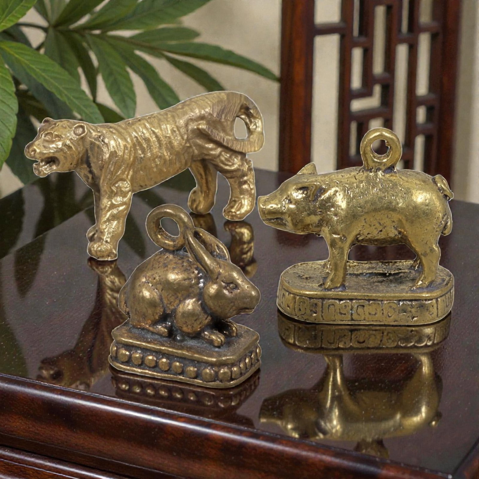 Thai Vintage Copper Alloy Zodiac Animal Amulets - 3pcs Set, 80ZB: This set of three devotional amulets is crafted from copper alloy, exhibiting a warm golden patina and subtle surface wear consistent with vintage Thai folk religious objects. Each piece depicts a sty