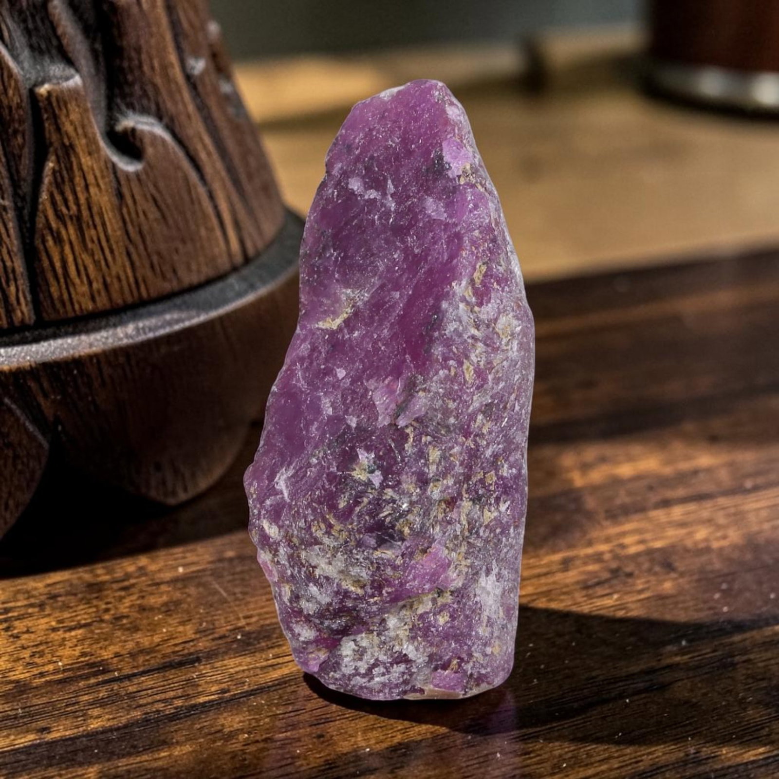 19.84ct Natural Mauritania Ruby Rough (Unheated), 50AT: Natural unheated corundum rough sourced from Mauritanian gem deposits, featuring a slender tapered crystalline form dominated by saturated uniform magenta-pink ruby corundum with sparse pale silicate 