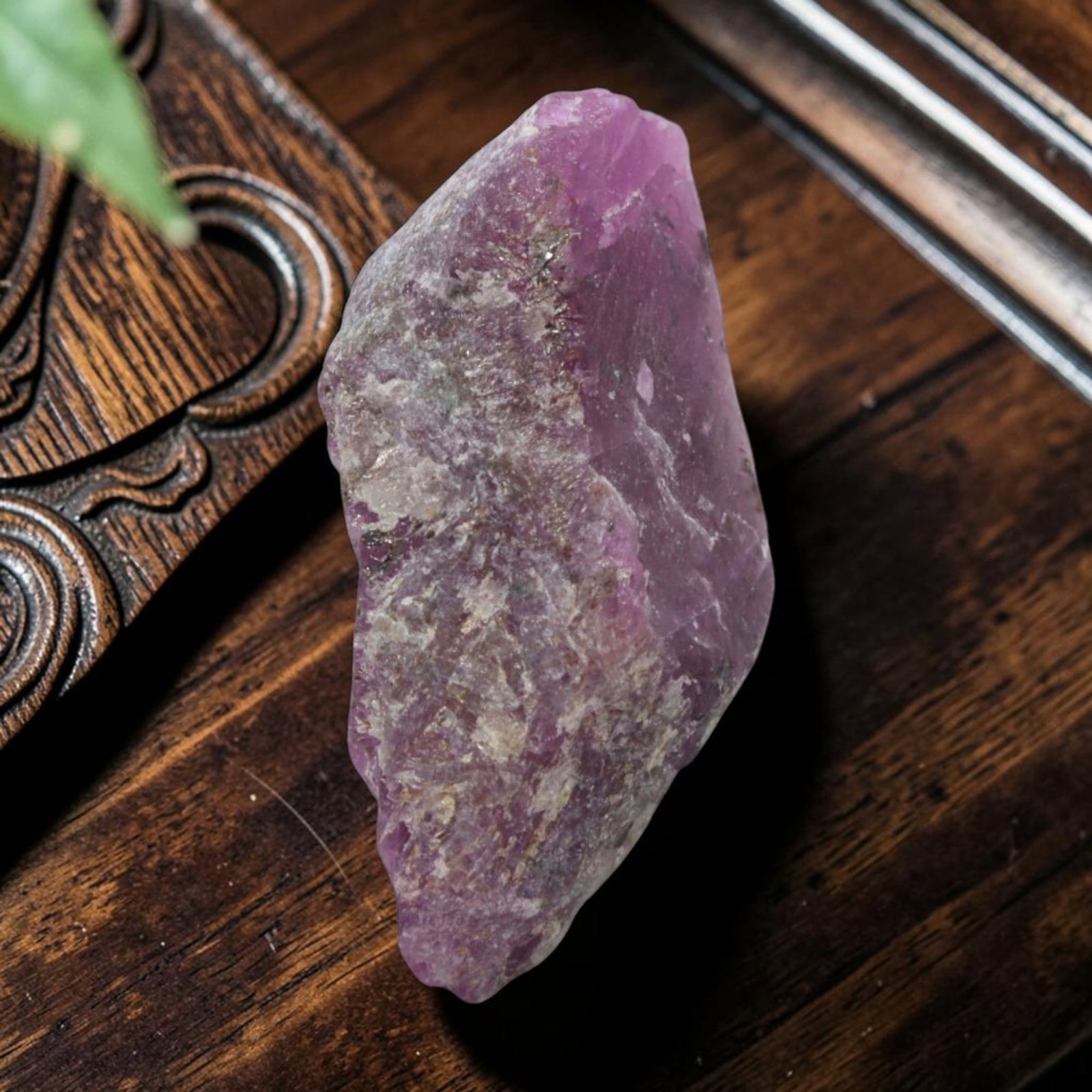13.03ct Natural Mauritania Ruby Rough (Unheated), 84XE: This unheated Mauritania ruby rough is a captivating natural crystal specimen, featuring vivid magenta-purple ruby formations embedded in a contrasting greyish matrix. The stone's rugged, unpolished s