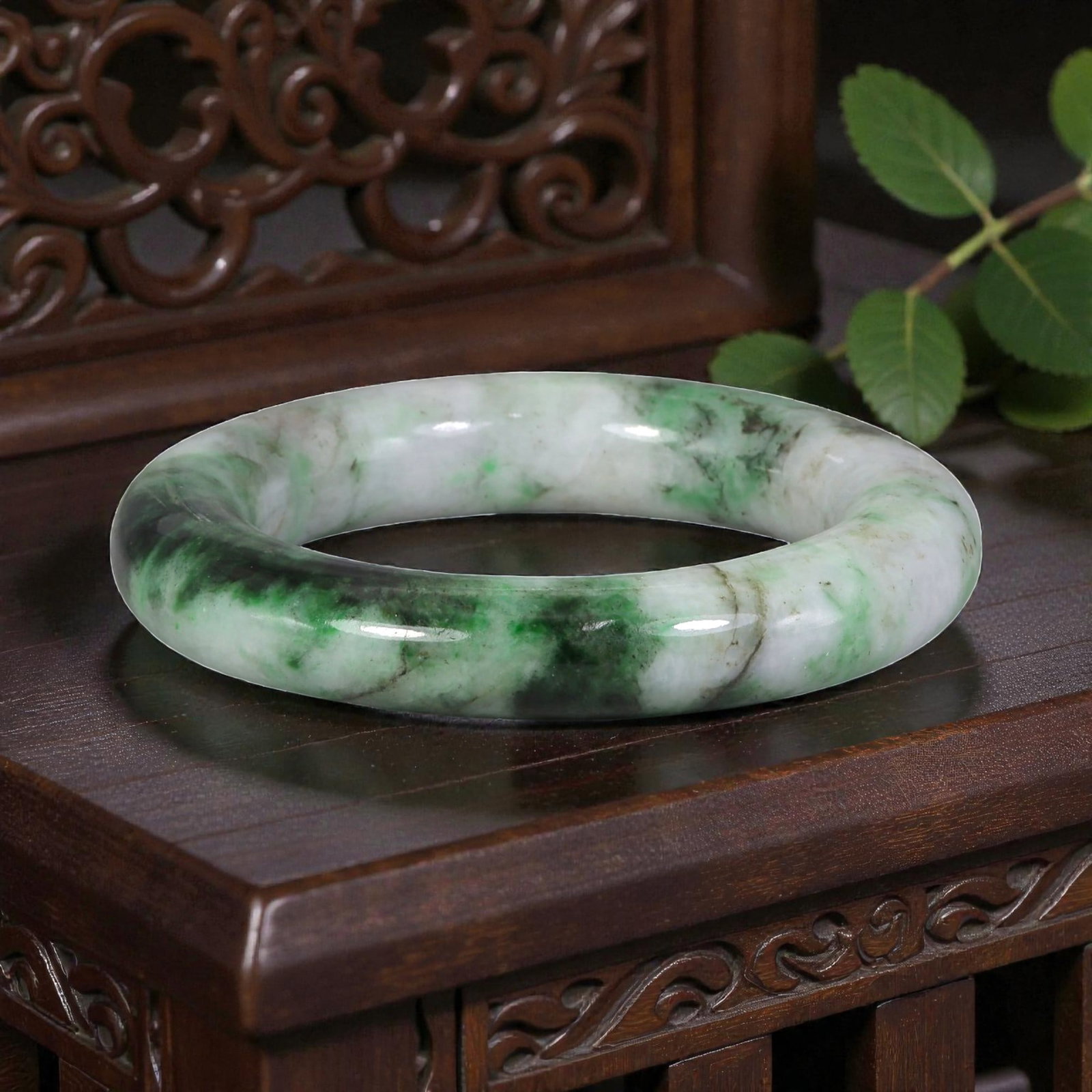 Natural Burmese Type A White & Green Jadeite Bangle - Bold Emerald Swirl Bracelet, 93XE: This is a thick, round-profile bangle crafted from natural Burmese Type A jadeite, displaying a creamy white base with striking, bold emerald-green swirls and dark accents throughout the polished ston