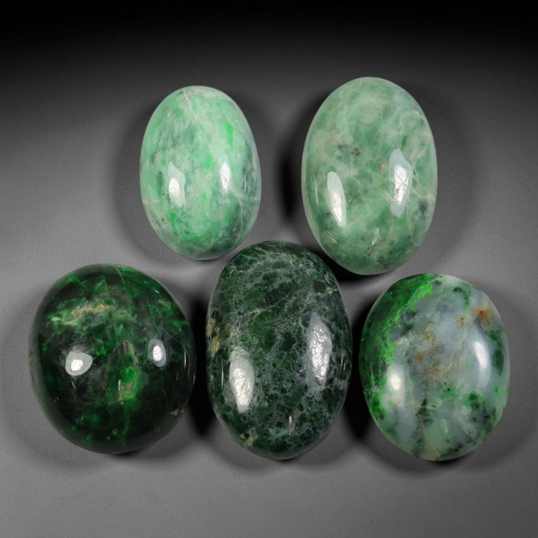 Lot of 5pcs 78ct Natural Burmese Type A Deep Forest Jadeite Jade Cabochons, 60AV: This wholesale gem bundle includes 5 fully untreated natural Burmese Type A oval jadeite jade cabochons, total combined weight 78ct with uniform sizing of 20x17mm. The set features two distinct tone g