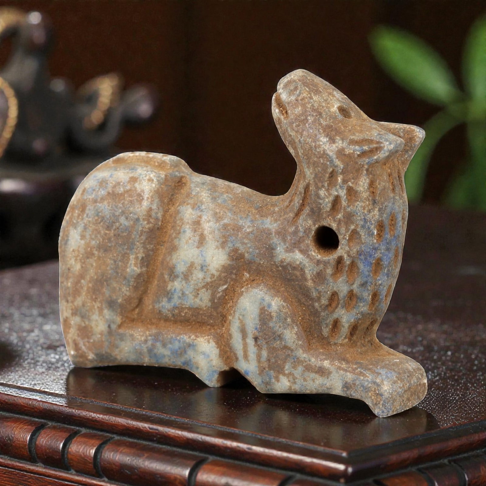 Ancient Lapis Lazuli Camel Amulet - Near Eastern Animal Talisman, 61AM: This amulet is carved from rich blue lapis lazuli with natural earthy inclusions, depicting a stylized camel in a recumbent, crouched posture. The piece features incised linear and stippled detailing 