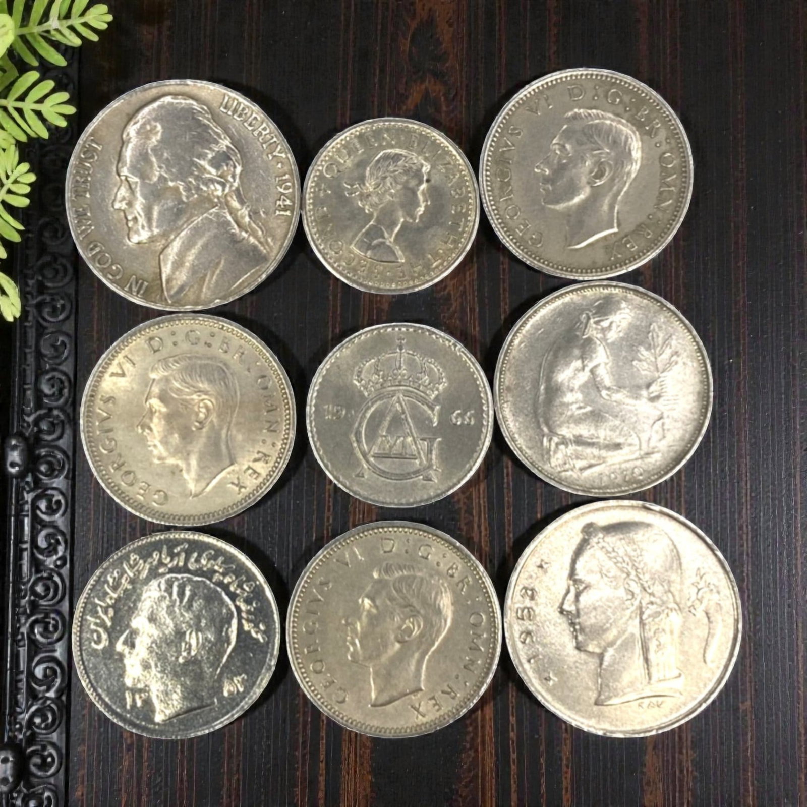 GLOBAL: Post-War Commonwealth & European Identity - 9-Piece Coins Set, 1941-1953, 17-20mm, 18ZJ: This curated 9-Piece Coins Set spans the pivotal post-war era, featuring coins from the United States, United Kingdom, New Zealand, Sweden, Belgium, and Egypt, ranging from 17 to 20mm in diameter. Eac