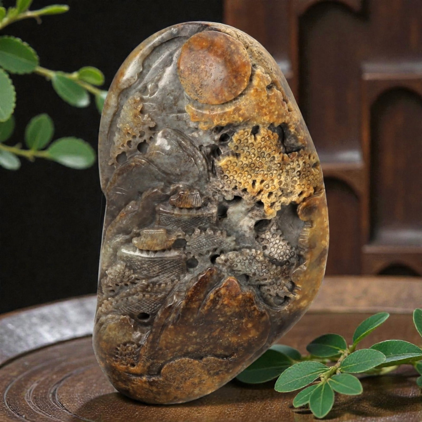 A Chinese 2-Tone Hetian Nephrite Jade Scholar's Rock-Form Display, 43FC: Carved from a naturally shaped piece of Hetian jade with variegated tones of warm russet, honey-brown, and cool gray, this freestanding display carving is worked in the manner of a miniature scholar's