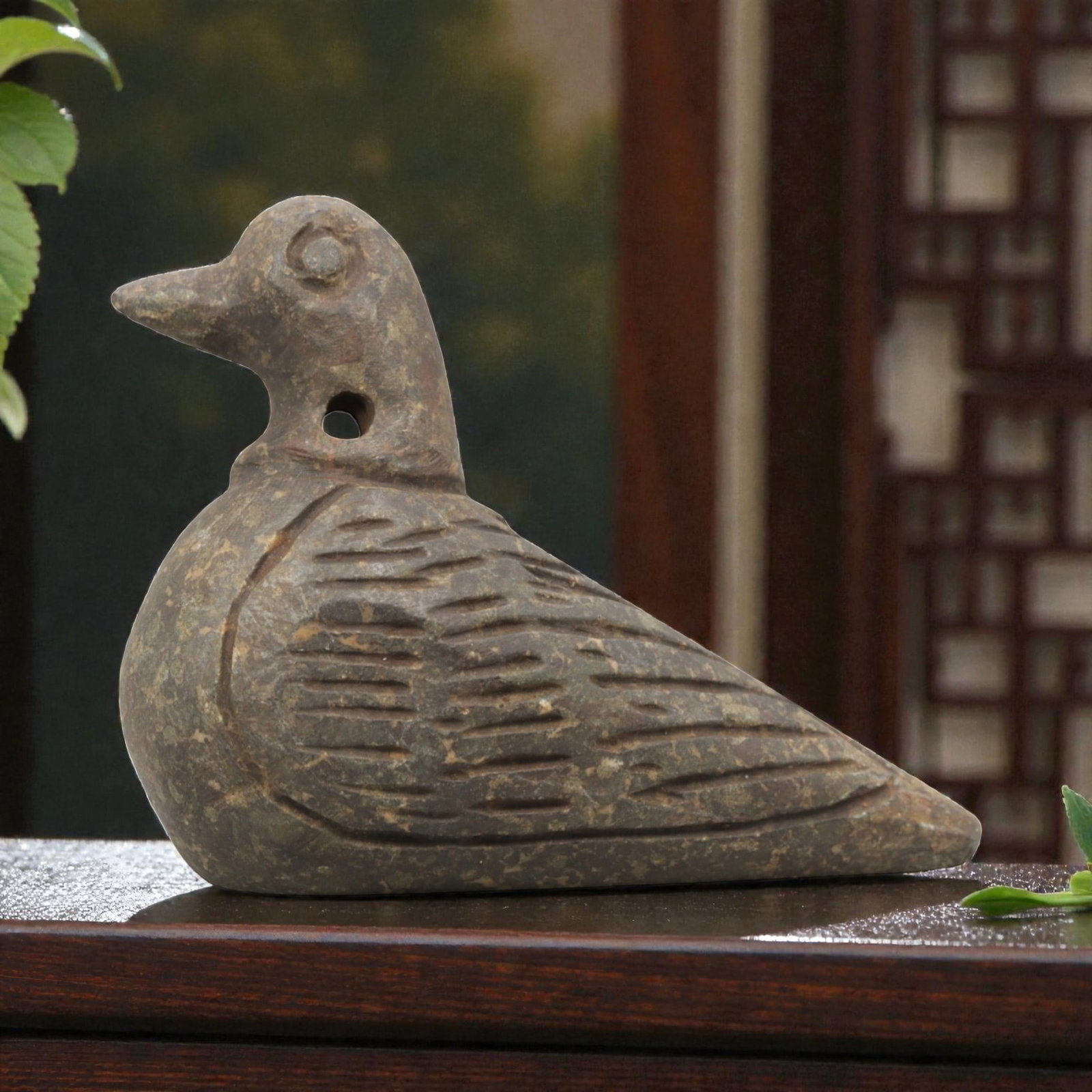 Ancient Schist Bird Amulet - Near Eastern Figurine, 86ZQ: Carved from schist, this bird amulet features a stylized avian form with incised detailing for wings and body texture. The stone has a muted earth-toned patina with minor surface wear consistent with 