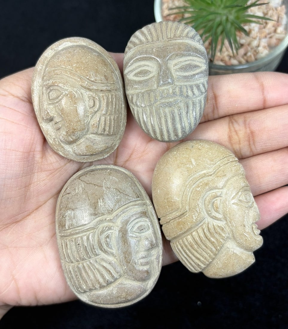 Lot Of 4 Antique Egyptian Steatite Intaglio with Profile Head Motif, 37YD: Crafted from steatite soapstone, each intaglio features hand-carved facial iconography consisting of both profile human heads and a frontal bearded male visage, rendered with incised detailing for hai