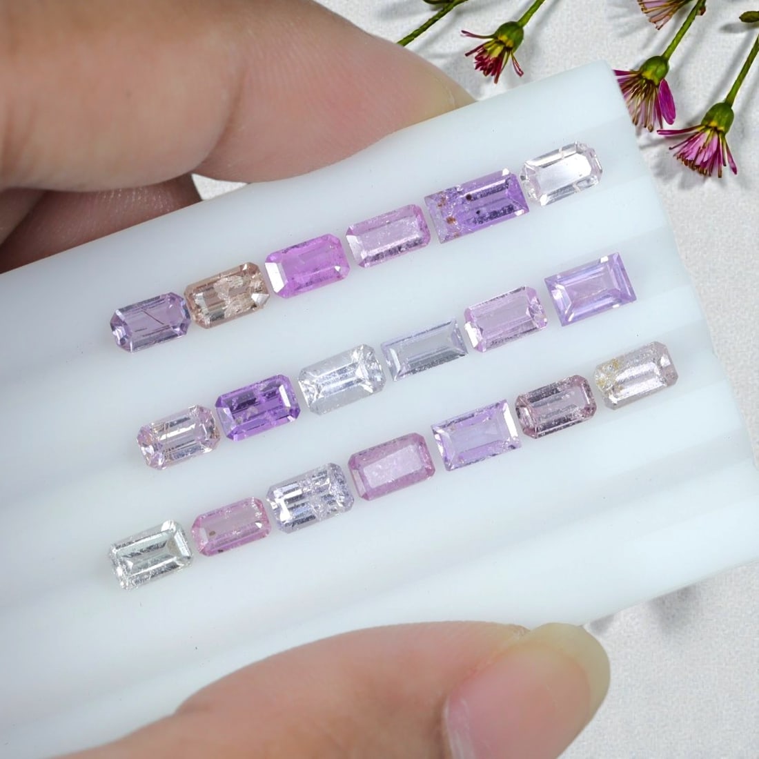 5.74 Carats Natural Pink Lavender Emerald Cut Sapphire Parcel - Heated Loose Gems, 20YH: This carefully assembled sapphire parcel features uniform emerald step cuts displaying a soft tonal range of pale transparent clear, blush pink, pastel lavender, and medium violet-purple hues across e