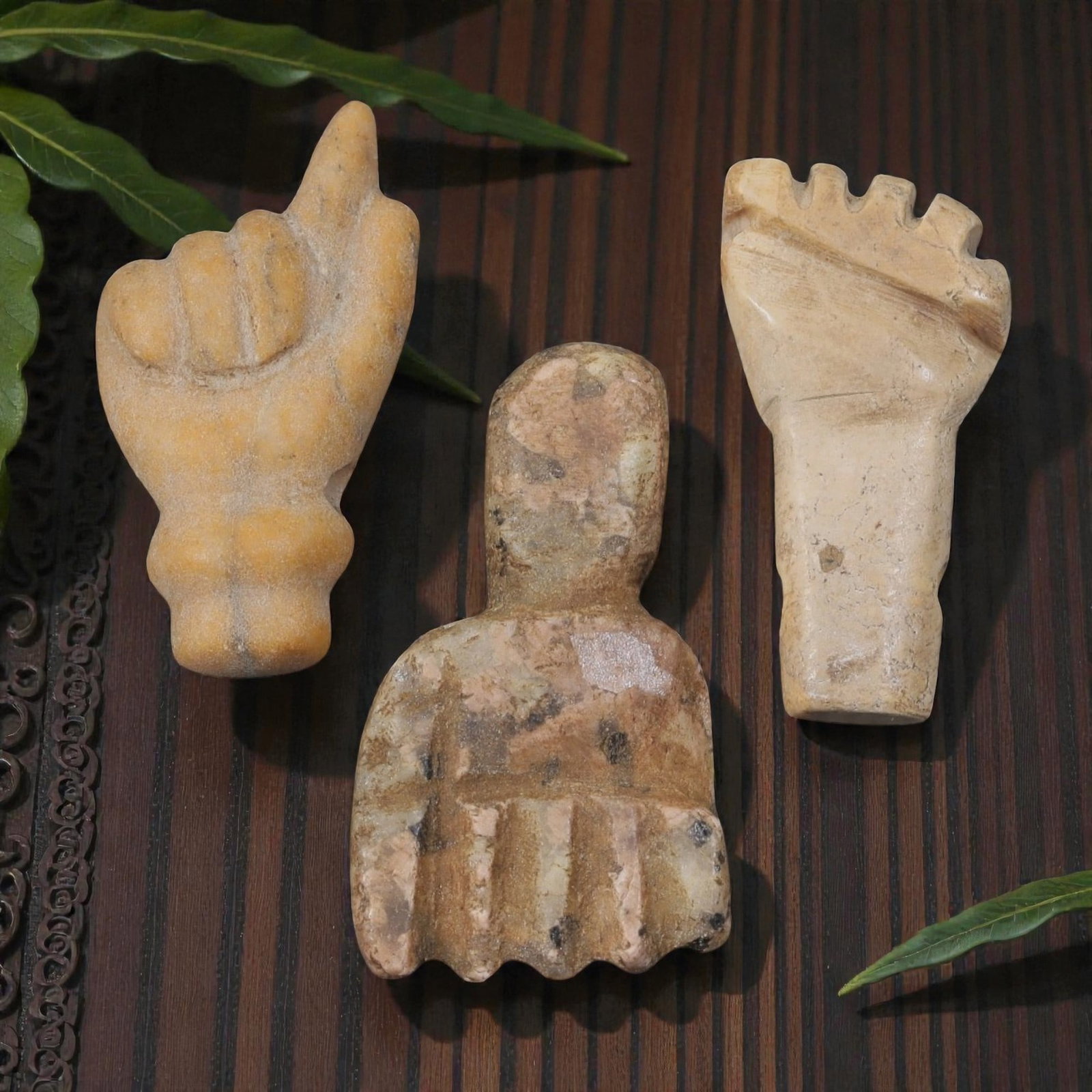 Lot of 3 Ancient Egyptian Stone Fist/Hand Amulets, Circa Late Period to Coptic Era, 12AE: Comprising three carved stone fist and hand amulets ranging from 2 cm to 2.5 cm, these pieces are characteristic protective talismans from ancient Egyptian traditions. Each is rendered in light-toned 