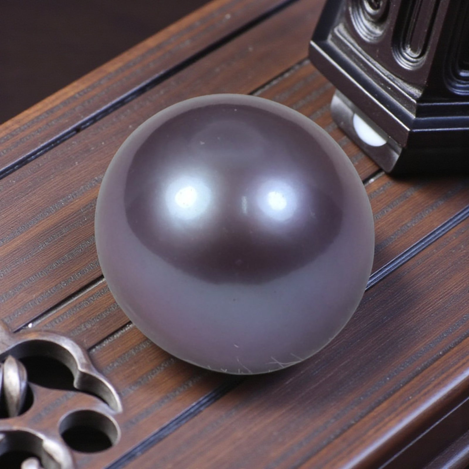 9.94ct Natural Freshwater Pearl - Smooth Lavender Sphere 11.3mm, 45YG: This specimen consists of natural freshwater pearl, fully polished into a perfectly rounded spherical cabochon with soft lavender nacre iridescence. Fine minor surface scuffs are visible across the ex